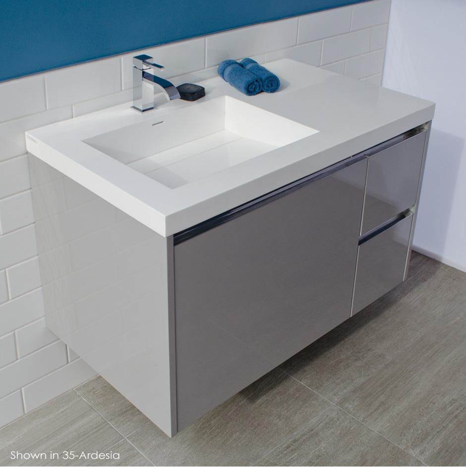 Lacava Wall-mount under counter vanity with three drawers, Bathroom Sink  is on the left.